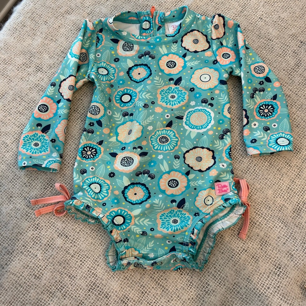 RuffleButts Rashguard Long-sleeve Swimsuit (12-18 months)